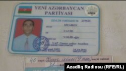 Azerbaijan - Party-membership card of one family in Ganja city - 03May2013